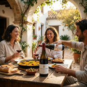 2022 Casar de Burbia - Mencia (750ml) | Create an ultra-photorealistic image featuring the uploaded 2022 Casar de Burbia - Mencia (750ml) in the provided image as the centerpiece, being shared among f