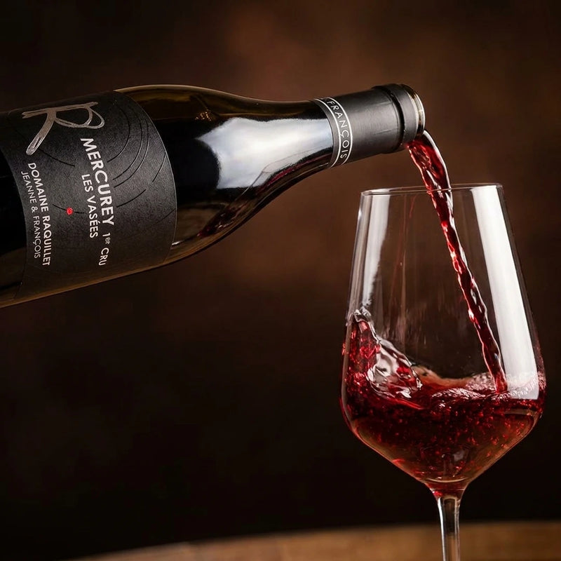 2023 Raquillet - Mercurey Vasees | This wine pouring into a glass.