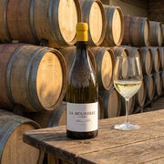 2024 Alphonse Mellot - Sancerre La Moussiere (750ml) | This wine with barrels of wine in the background.
