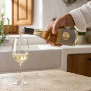 2024 Pago de los Capellanes -  O'Luar do Sil Godello (750ml) | Create an ultra-photorealistic commercial photograph featuring the uploaded 2024 Pago de los Capellanes - O'Luar do Sil Godello (750ml) in the provided image as
